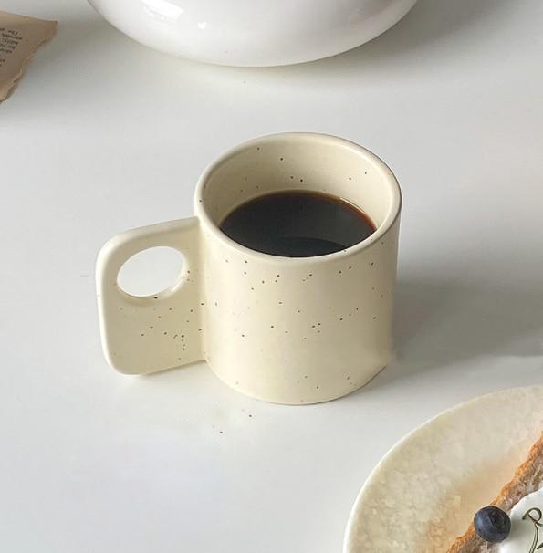 rounded splashed ink ceramic mug with handle