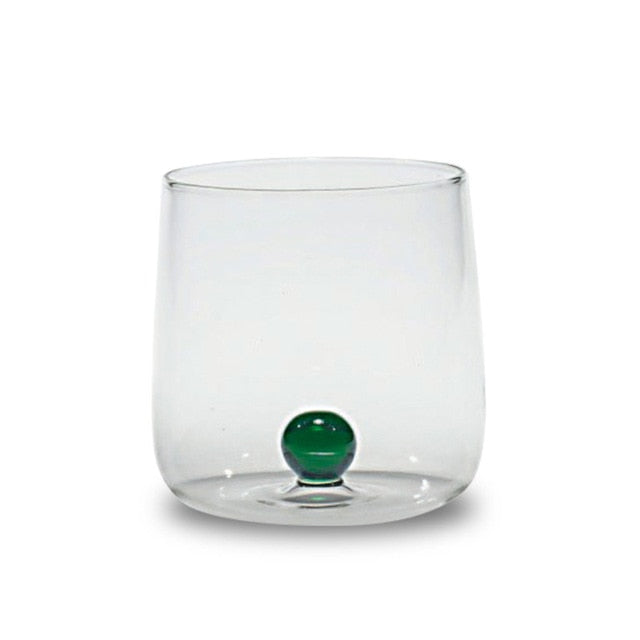 round acrylic Glass Vibrant clear cup with green ball