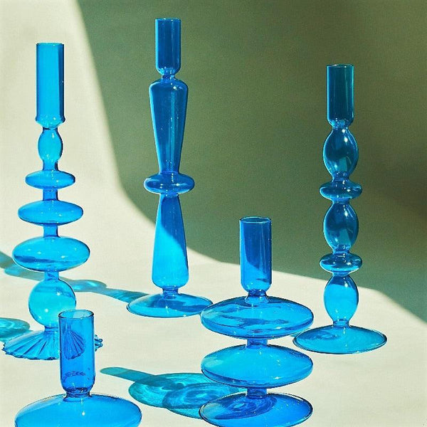 Bougeoirs en verre bleu cyan 